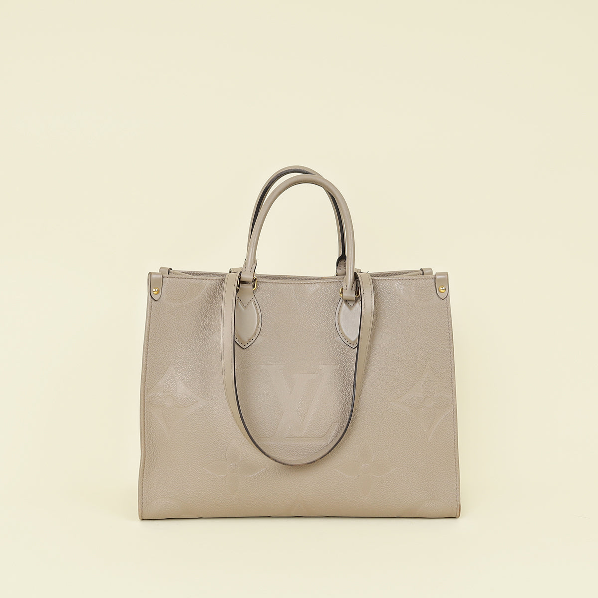 Louis Vuitton Tourterelle Beige Monogram Giant Empreinte Onthego MM Bag