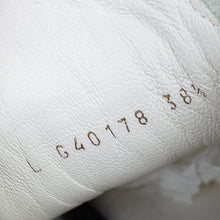 Chanel White Quilted Low Top Sneakers 38.5