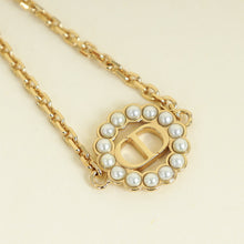 Christian Dior Gold Petit CD Lucky Baroque Bracelet