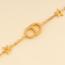 Christian Dior Gold Finish CD & Star Clair D Lune Set  Bracelet