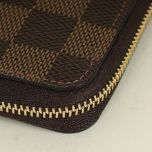 Louis Vuitton Ebene Multicolor Christmas Animation Ice Skating Zippy Coin Purse