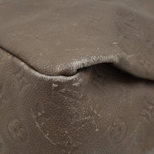 Louis Vuitton Terre Monogram Empreinte Artsy MM Bag