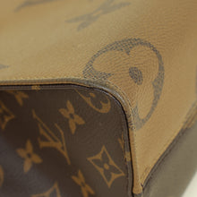 Louis Vuitton Monogram Reverse OnTheGo PM Bag