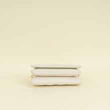 Louis Vuitton Creme Monogram-Embossed Pochette Coussin Bag