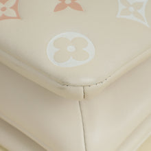 Louis Vuitton Creme Monogram-Embossed Pochette Coussin Bag