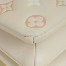 Louis Vuitton Creme Monogram-Embossed Pochette Coussin Bag