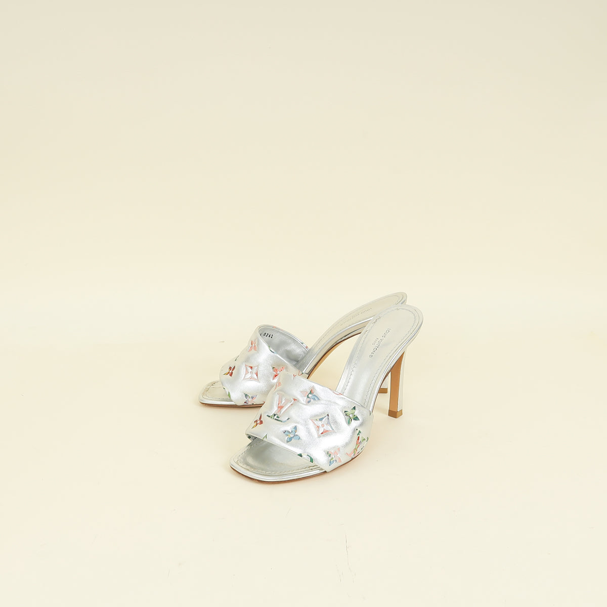 Louis Vuitton Metallic Silver Monogram Embossed Revival Mules 38