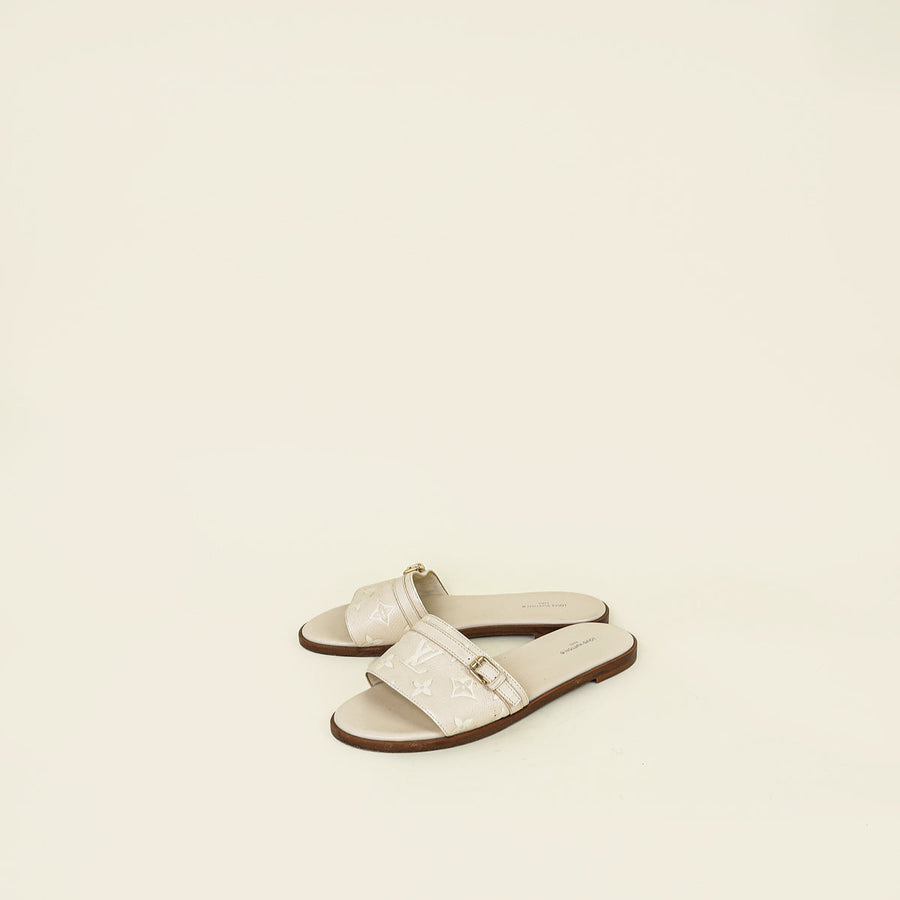 Louis Vuitton Cream Monogram Empreinte Lockit Flat Mules 38.5