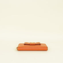 Prada Orange Bow Zip Around Wallet