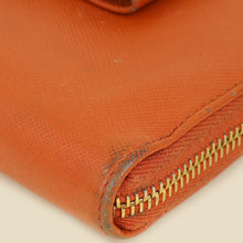 Prada Orange Bow Zip Around Wallet