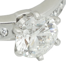 Tiffany & Co, Platinum Setting Engagement Ring with a Channel-set Diamond Band