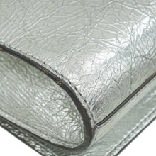 YSL Metallic Silver Belle De Jour Clutch